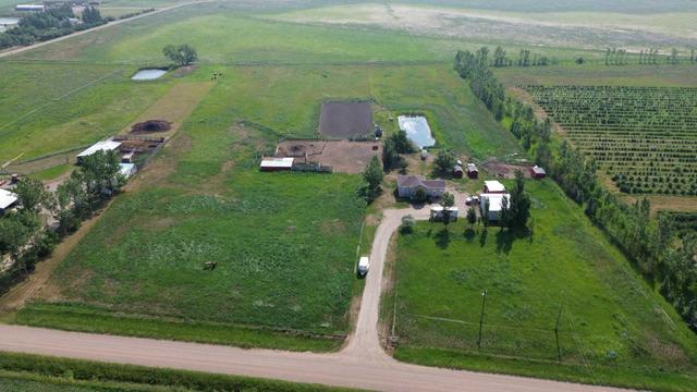 205023 Twp Road 100, House detached with 4 bedrooms, 2 bathrooms and null parking in Lethbridge County AB | Image 4