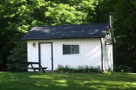 9828 Highway 118 Rd, Home with 2 bedrooms, 1 bathrooms and 6 parking in Algonquin Highlands ON | Image 3