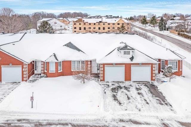 #2-90 Thompsons Rd, Townhouse with 2 bedrooms, 2 bathrooms and 2 parking in Penetanguishene ON | Image 1