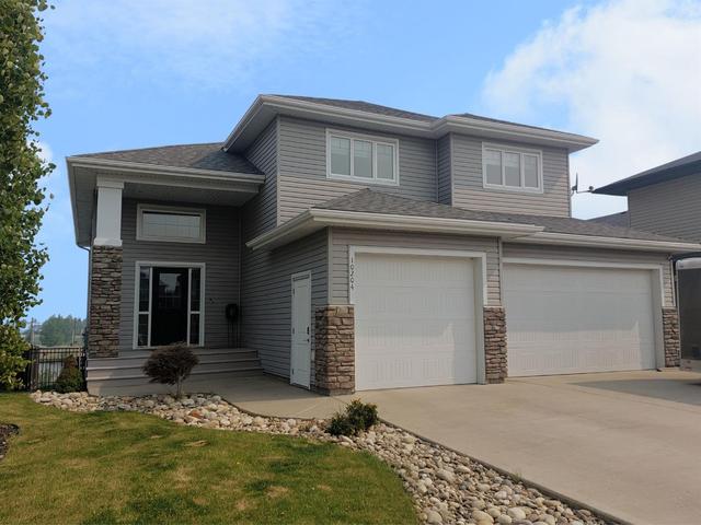 10204 94 Avenue, House detached with 5 bedrooms, 3 bathrooms and 6 parking in Sexsmith AB | Image 1