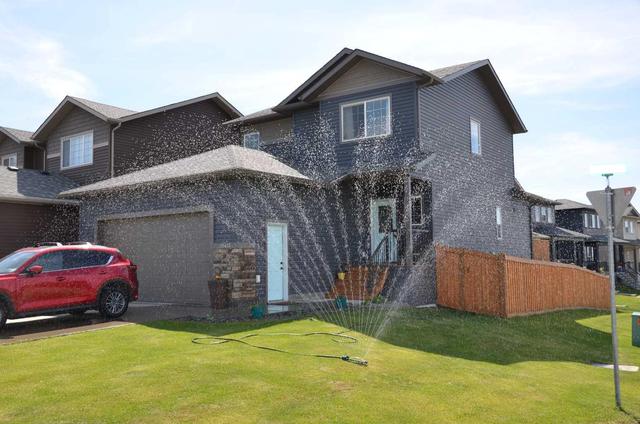 10413 135 Avenue, House detached with 3 bedrooms, 2 bathrooms and 4 parking in Grande Prairie AB | Image 1