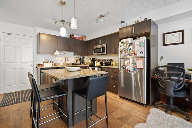 6215 - 755 Copperpond Boulevard Se, Condo with 1 bedrooms, 1 bathrooms and 2 parking in Calgary AB | Image 4