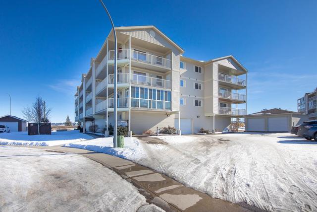 302 - 4520 45a Street Close, Condo with 2 bedrooms, 1 bathrooms and 1 parking in Red Deer County AB | Image 1