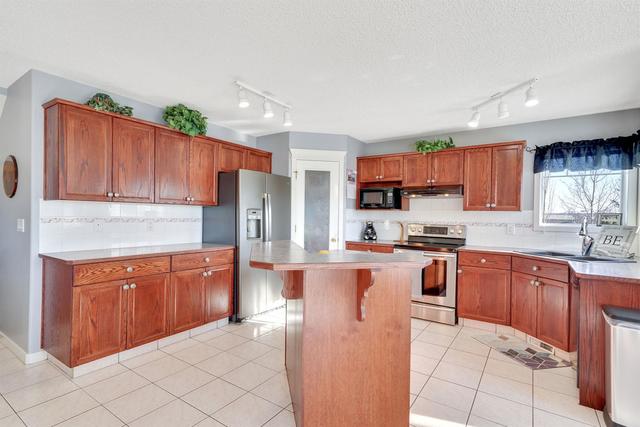 217 Hidden Creek Boulevard Nw, House detached with 3 bedrooms, 3 bathrooms and 4 parking in Calgary AB | Image 14