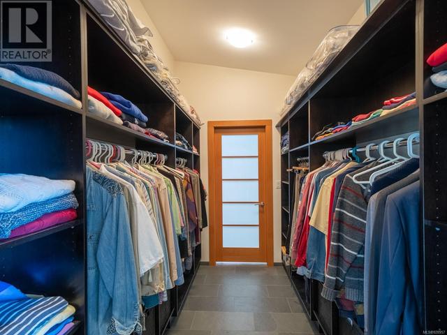 Closet - door at the end goes to the laundry - very handy | Image 39