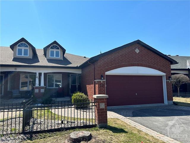 13 Coulson Court, Townhouse with 3 bedrooms, 2 bathrooms and 4 parking in Ottawa ON | Image 1