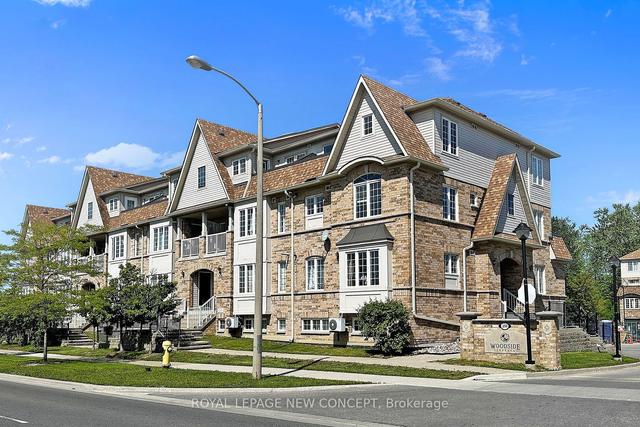 16 - 200 Mclevin Ave, Townhouse with 3 bedrooms, 2 bathrooms and 2 parking in Toronto ON | Image 1