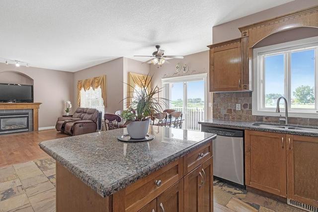 111 East Lakeview Court, House detached with 4 bedrooms, 2 bathrooms and 4 parking in Chestermere AB | Image 10