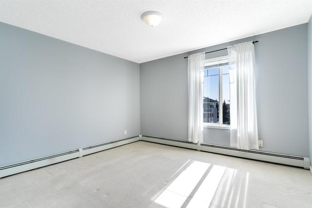 313 - 9 Country Village Bay Ne, Condo with 2 bedrooms, 2 bathrooms and 1 parking in Calgary AB | Image 23
