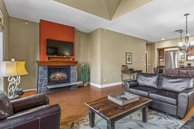 407 - 187 Kananaskis Way, Condo with 3 bedrooms, 2 bathrooms and 1 parking in Canmore AB | Image 10