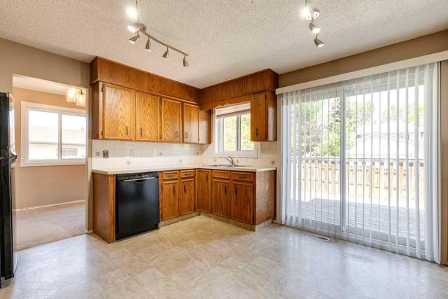 132 Woodford Drive Sw, House detached with 4 bedrooms, 2 bathrooms and 2 parking in Calgary AB | Image 3