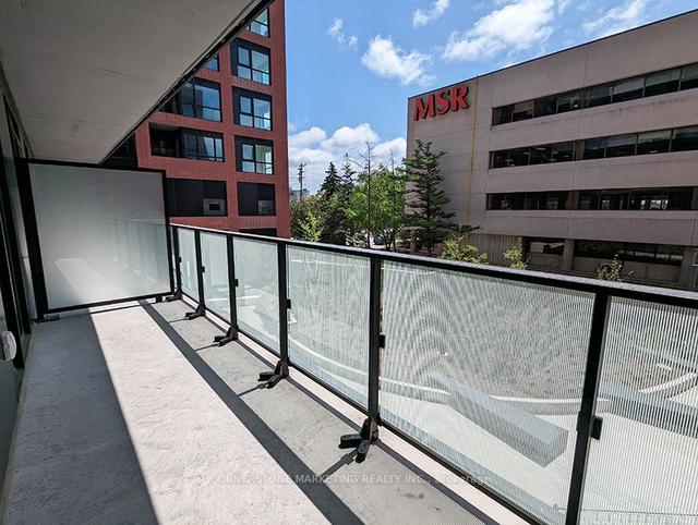 211 - 8 Tippett Rd, Condo with 2 bedrooms, 2 bathrooms and 1 parking in Toronto ON | Image 3