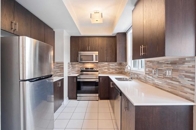 13 - 9621 Jane St, Townhouse with 2 bedrooms, 2 bathrooms and 1 parking in Vaughan ON | Image 2