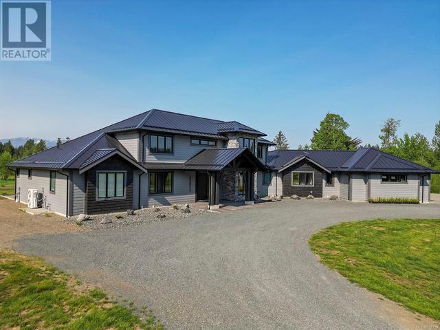 2355 Coleman Rd, House detached with 5 bedrooms, 4 bathrooms and 12 parking in Comox Valley B (Lazo North) BC | Image 5