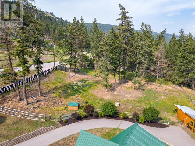 6741 Highway 33, E, House detached with 4 bedrooms, 2 bathrooms and 12 parking in Kelowna BC | Image 45