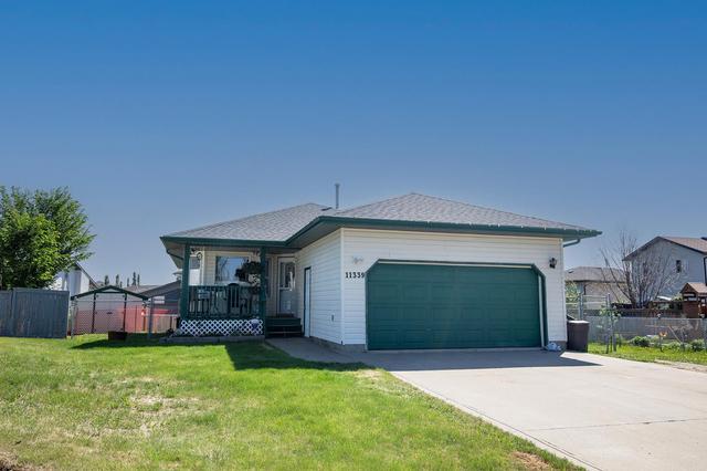 11339 91 Street, House detached with 4 bedrooms, 2 bathrooms and 4 parking in Grande Prairie AB | Image 1