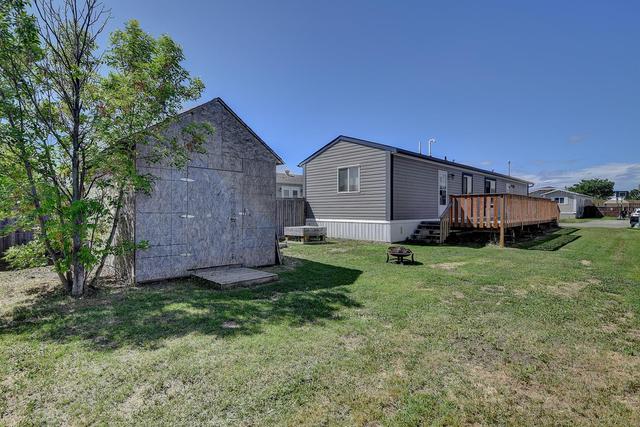 8805 88c Street, House detached with 3 bedrooms, 2 bathrooms and 2 parking in Grande Prairie AB | Image 3