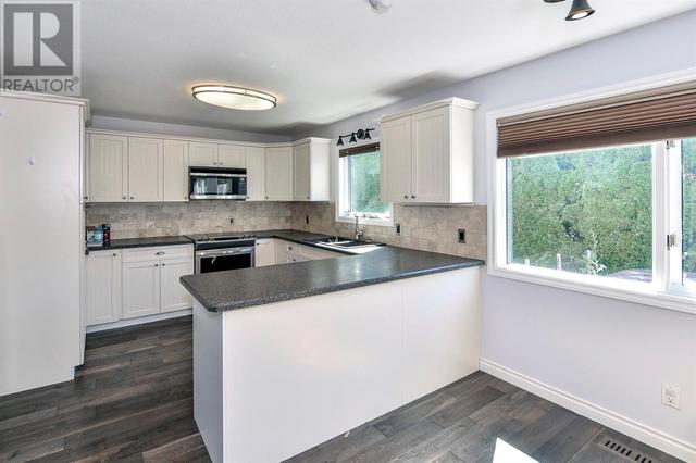 827 Springwood Court, House detached with 4 bedrooms, 2 bathrooms and null parking in Kelowna BC | Image 17