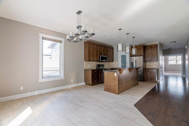 415 Killdeer Way, House detached with 5 bedrooms, 3 bathrooms and 6 parking in Wood Buffalo AB | Image 4