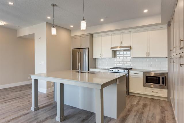 410 - 1702 17 Avenue Sw, Condo with 3 bedrooms, 2 bathrooms and 2 parking in Calgary AB | Image 3