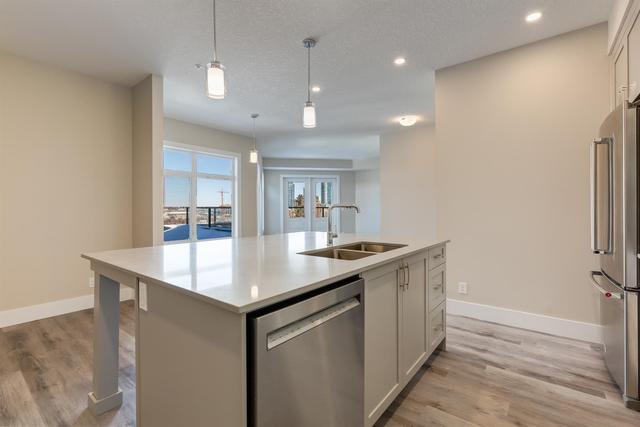 410 - 1702 17 Avenue Sw, Condo with 3 bedrooms, 2 bathrooms and 2 parking in Calgary AB | Image 4