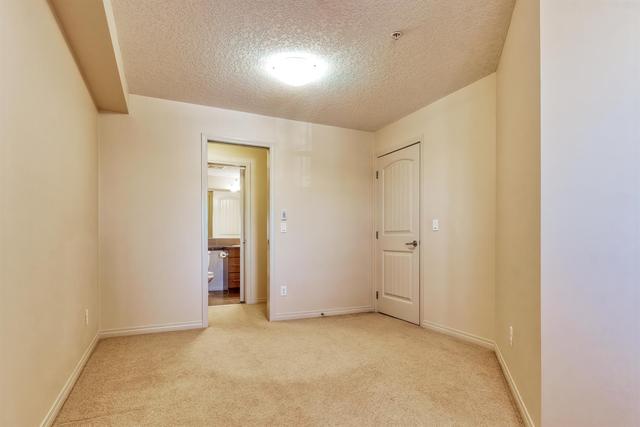 2212 - 175 Panatella Hill Nw, Condo with 2 bedrooms, 2 bathrooms and 1 parking in Calgary AB | Image 11