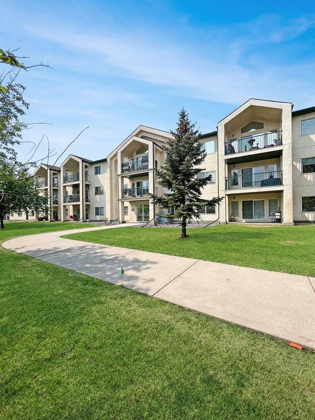 207 - 9111 104 Avenue, Condo with 2 bedrooms, 2 bathrooms and 1 parking in Grande Prairie AB | Image 4