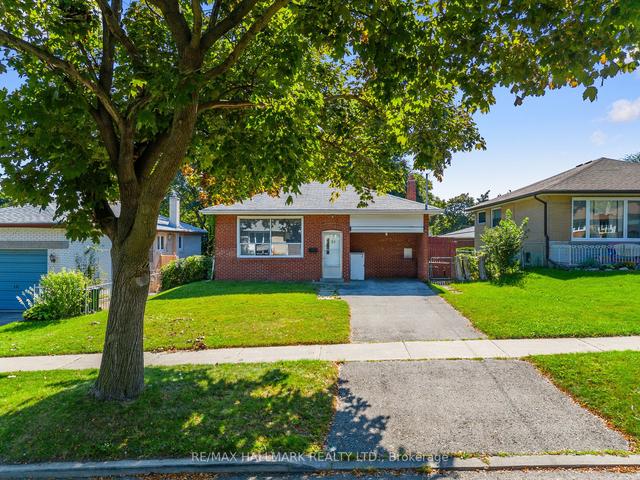 59 Hollyhedge Dr, House detached with 3 bedrooms, 1 bathrooms and 2 parking in Toronto ON | Image 1