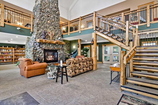 215 - 175 Crossbow Place, Condo with 2 bedrooms, 2 bathrooms and 1 parking in Canmore AB | Image 33