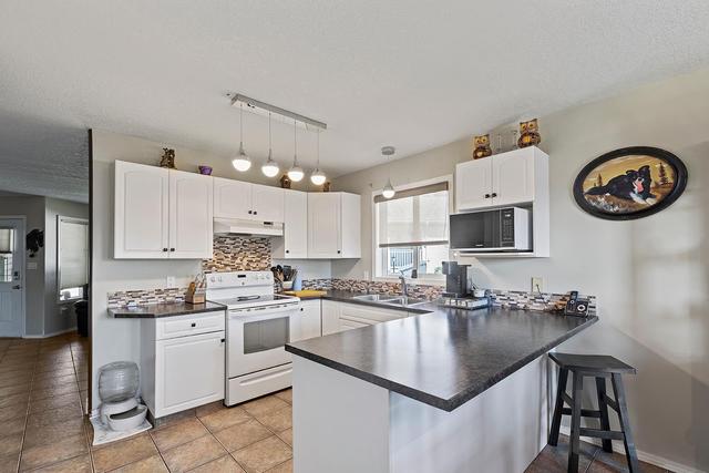 11339 91 Street, House detached with 4 bedrooms, 2 bathrooms and 4 parking in Grande Prairie AB | Image 3