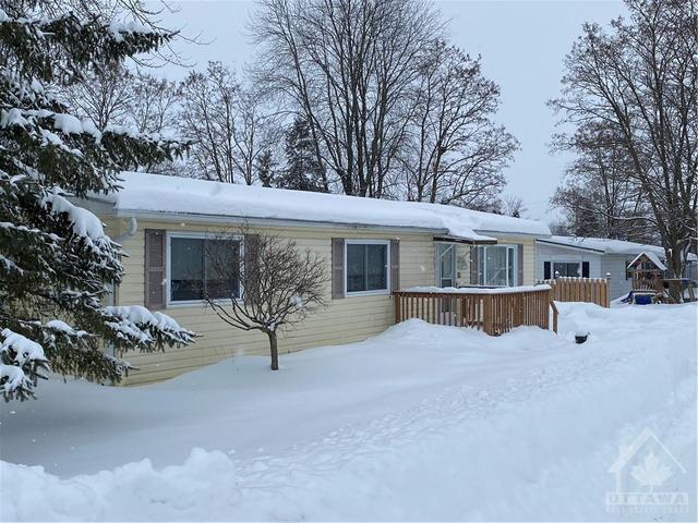 10 Cassell Lane, House detached with 3 bedrooms, 1 bathrooms and 4 parking in Rideau Lakes ON | Image 1