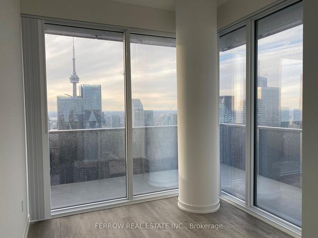 7001 - 55 Cooper St, Condo with 2 bedrooms, 2 bathrooms and 0 parking in Toronto ON | Image 2