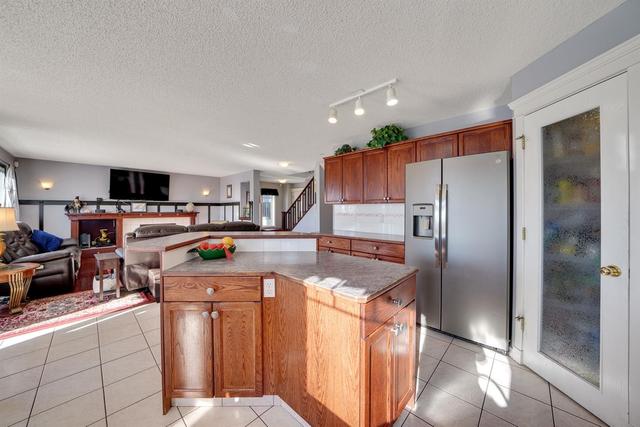 217 Hidden Creek Boulevard Nw, House detached with 3 bedrooms, 3 bathrooms and 4 parking in Calgary AB | Image 16