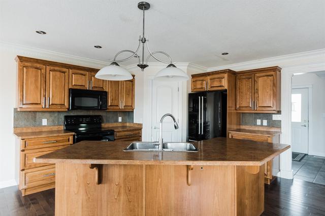 207 Rattlepan Creek Crescent, House detached with 4 bedrooms, 3 bathrooms and 4 parking in Wood Buffalo AB | Image 6