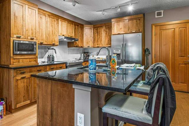 221 - 106 Stewart Creek Landing, Condo with 1 bedrooms, 2 bathrooms and 1 parking in Canmore AB | Image 9