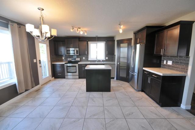 7306 115b Street, House detached with 5 bedrooms, 3 bathrooms and 6 parking in Grande Prairie AB | Image 4