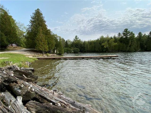 1032 Log Cabin Lane, House detached with 6 bedrooms, 5 bathrooms and 10 parking in North Frontenac ON | Image 25