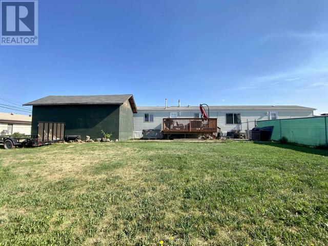 10601 101 Street, House other with 3 bedrooms, 2 bathrooms and null parking in Taylor BC | Image 4