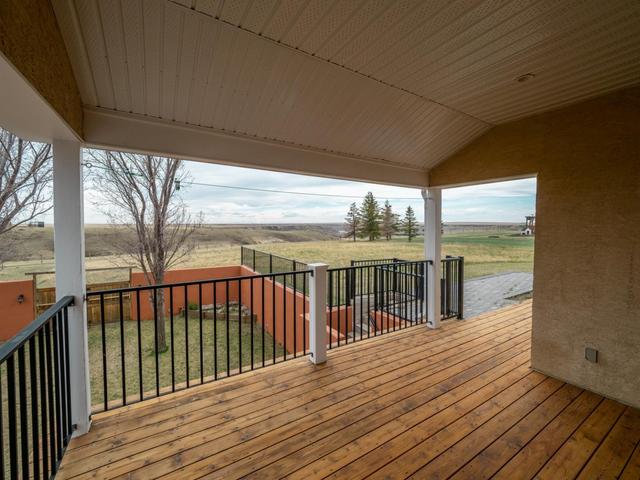 221 Falcon Ridge Way, House detached with 5 bedrooms, 5 bathrooms and 4 parking in Lethbridge County AB | Image 37