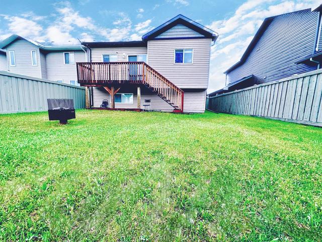 8809 94 Avenue, House other with 5 bedrooms, 2 bathrooms and 4 parking in Grande Prairie AB | Image 3