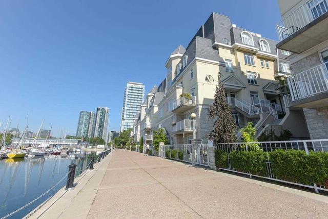 103 - 28 Stadium Rd, Townhouse with 2 bedrooms, 3 bathrooms and 2 parking in Toronto ON | Image 1