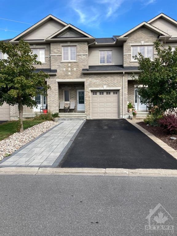 126 Whispering Winds Way, Townhouse with 3 bedrooms, 3 bathrooms and 5 parking in Ottawa ON | Image 2