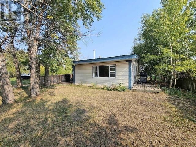 10855 102 Street, House detached with 2 bedrooms, 1 bathrooms and null parking in Taylor BC | Image 32