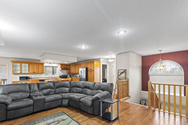 10303 99a Avenue, House detached with 6 bedrooms, 4 bathrooms and 6 parking in Sexsmith AB | Image 9