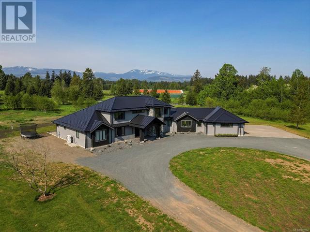 2355 Coleman Rd, House detached with 5 bedrooms, 4 bathrooms and 12 parking in Comox Valley B (Lazo North) BC | Image 4