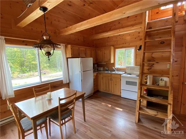 1032 Log Cabin Lane, House detached with 6 bedrooms, 5 bathrooms and 10 parking in North Frontenac ON | Image 12