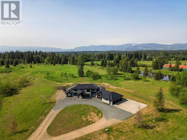 2355 Coleman Rd, House detached with 5 bedrooms, 4 bathrooms and 12 parking in Comox Valley B (Lazo North) BC | Image 3