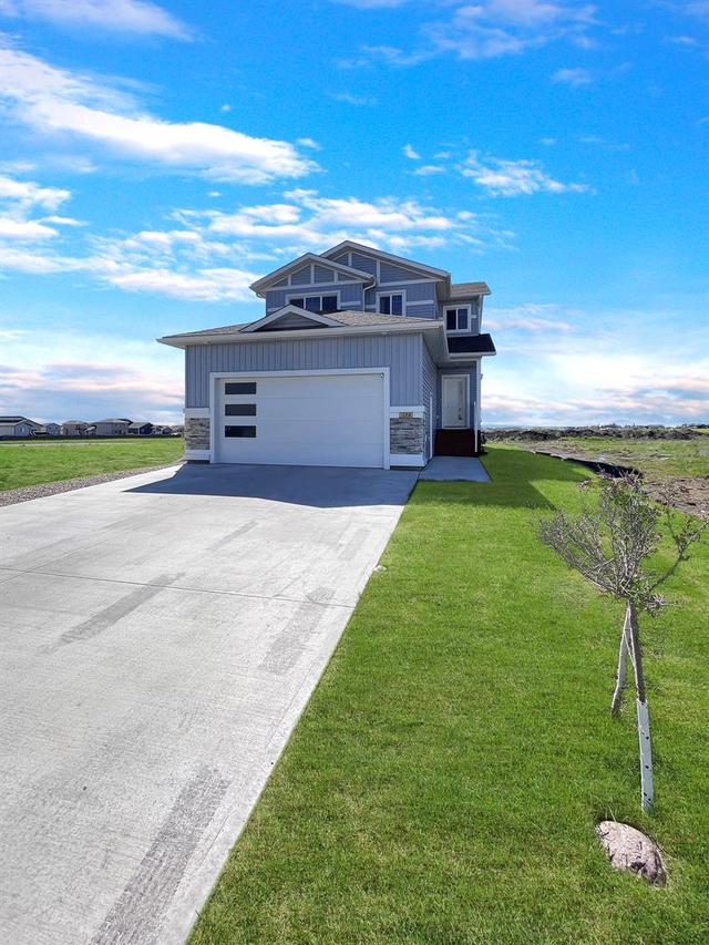 12918 102a Street, House detached with 4 bedrooms, 3 bathrooms and 6 parking in Grande Prairie AB | Image 2
