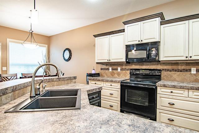 77 - 26540 Highway 11, House detached with 5 bedrooms, 3 bathrooms and null parking in Red Deer County AB | Image 4