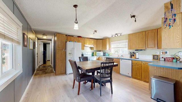 215 Grant Way, House detached with 3 bedrooms, 2 bathrooms and 4 parking in Wood Buffalo AB | Image 4